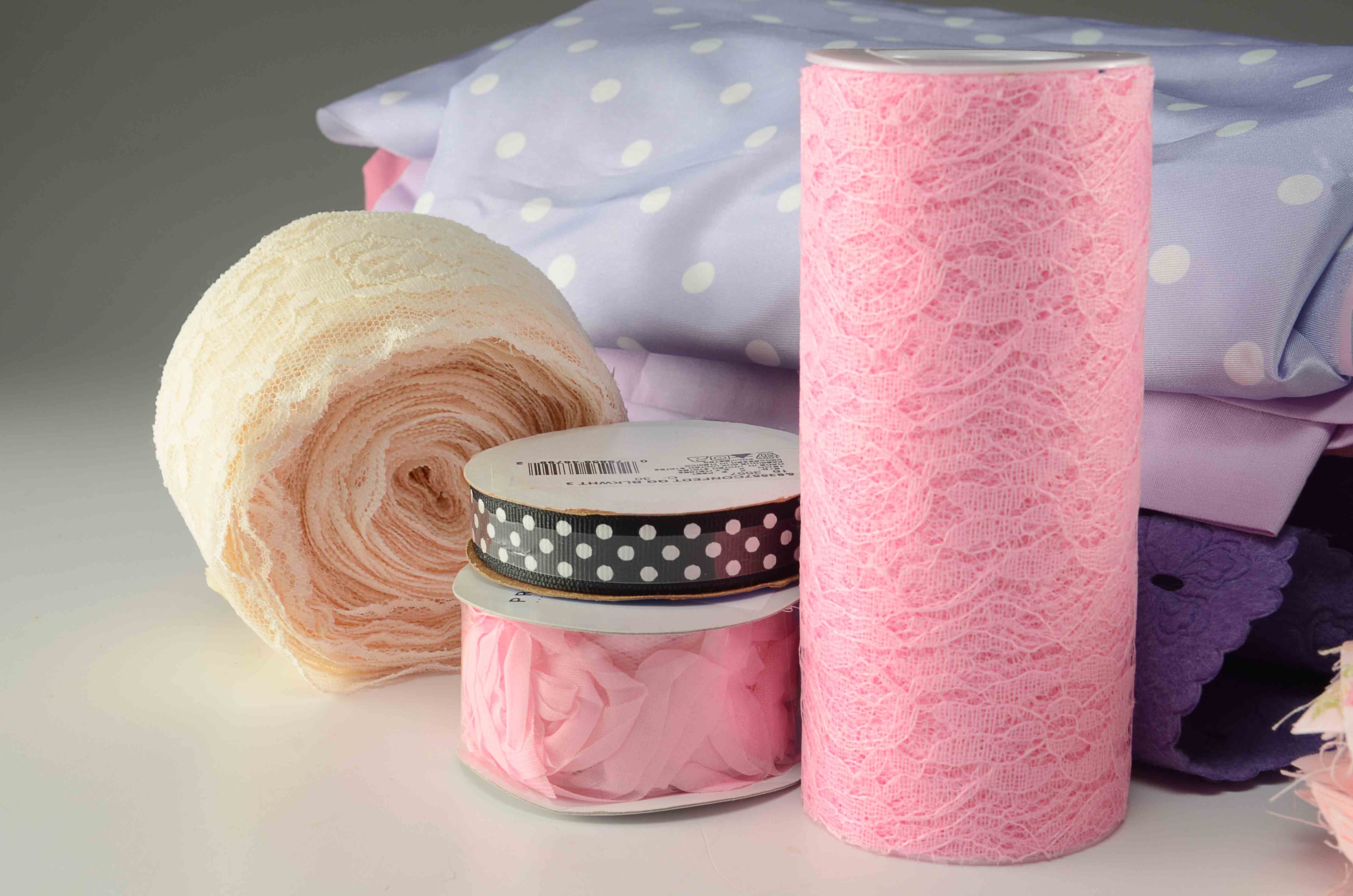 Quilting Squares, Fabric and Sewing Ribbon.