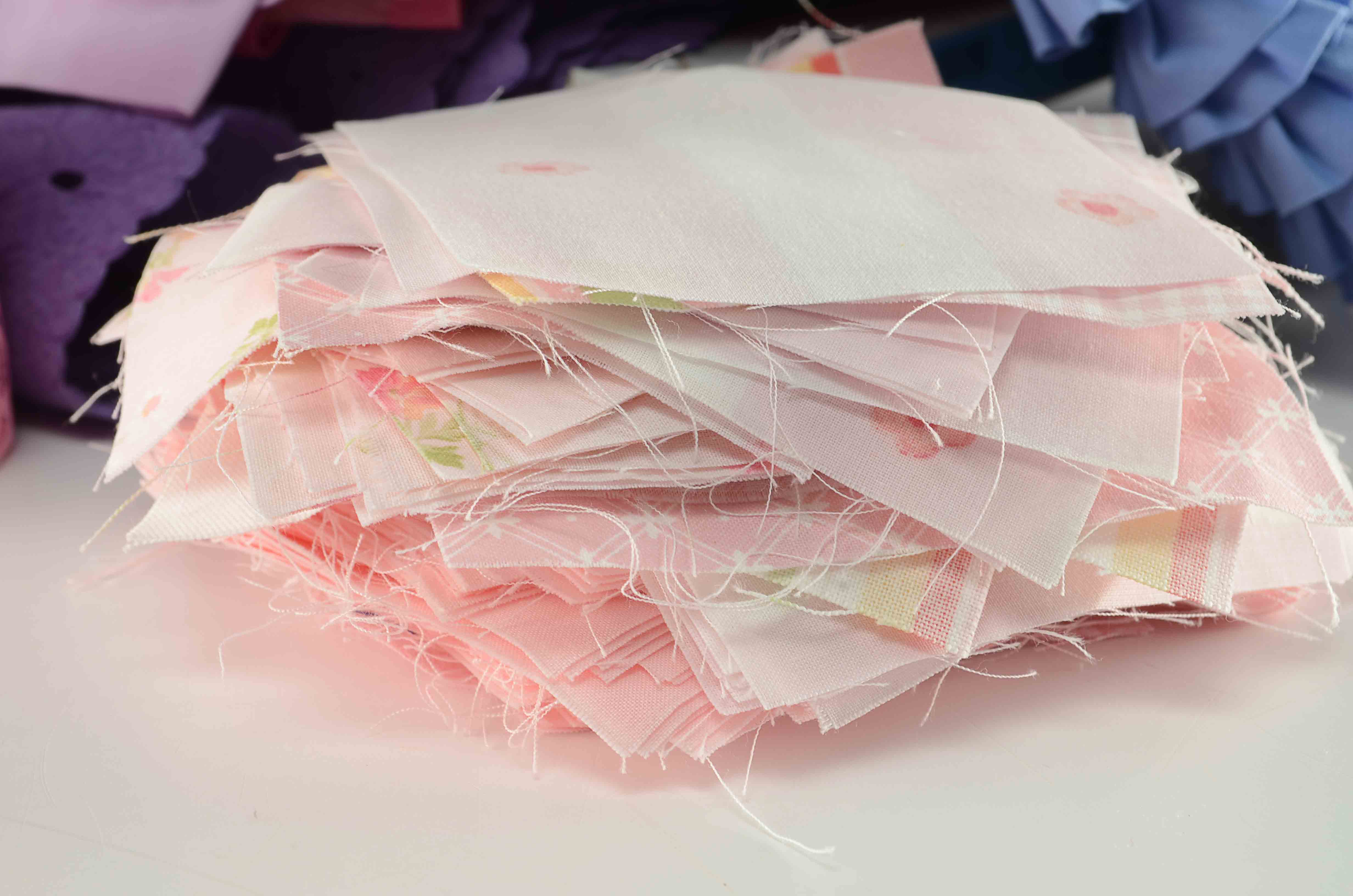 Quilting Squares, Fabric and Sewing Ribbon.