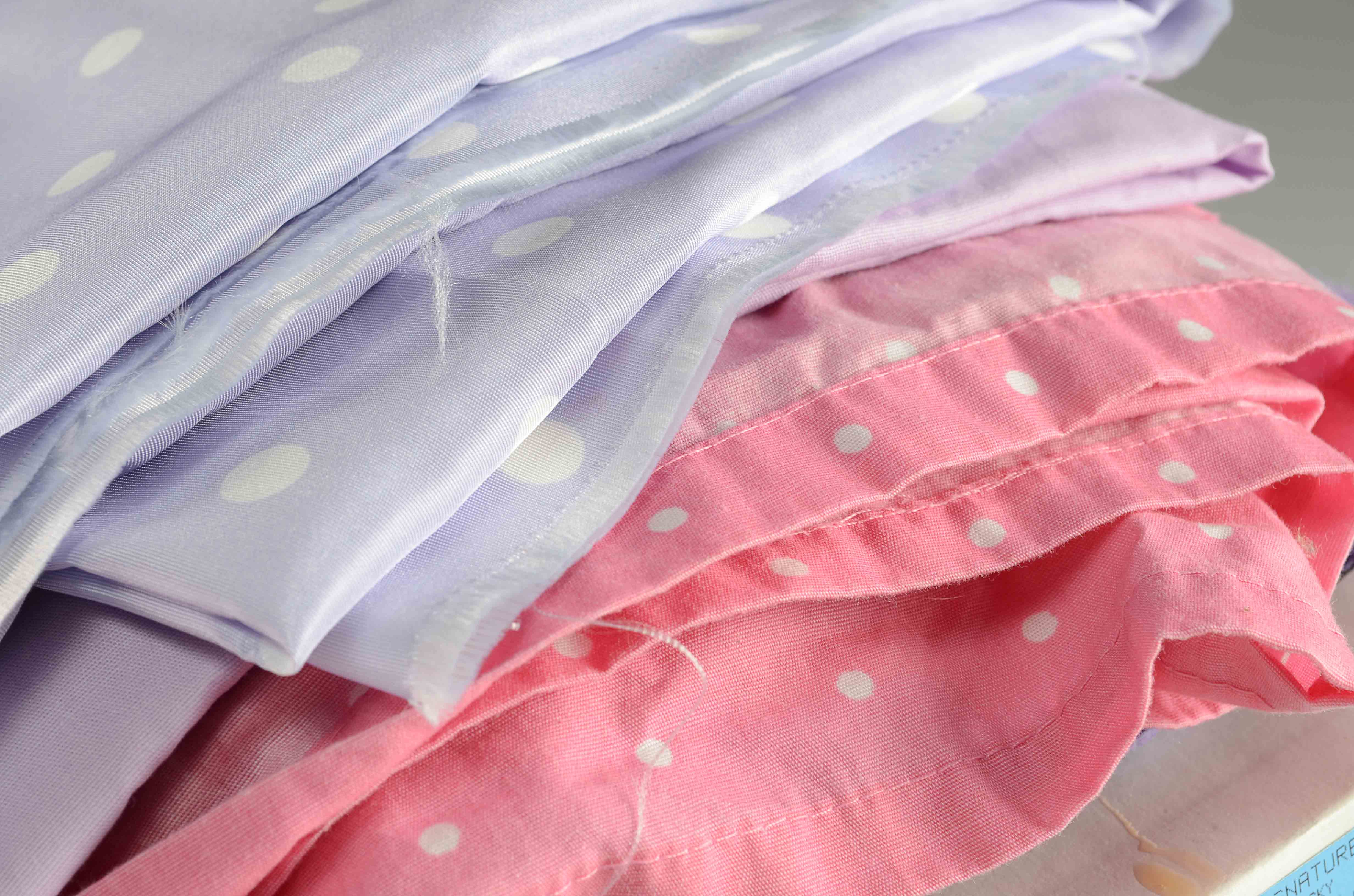 Quilting Squares, Fabric and Sewing Ribbon.