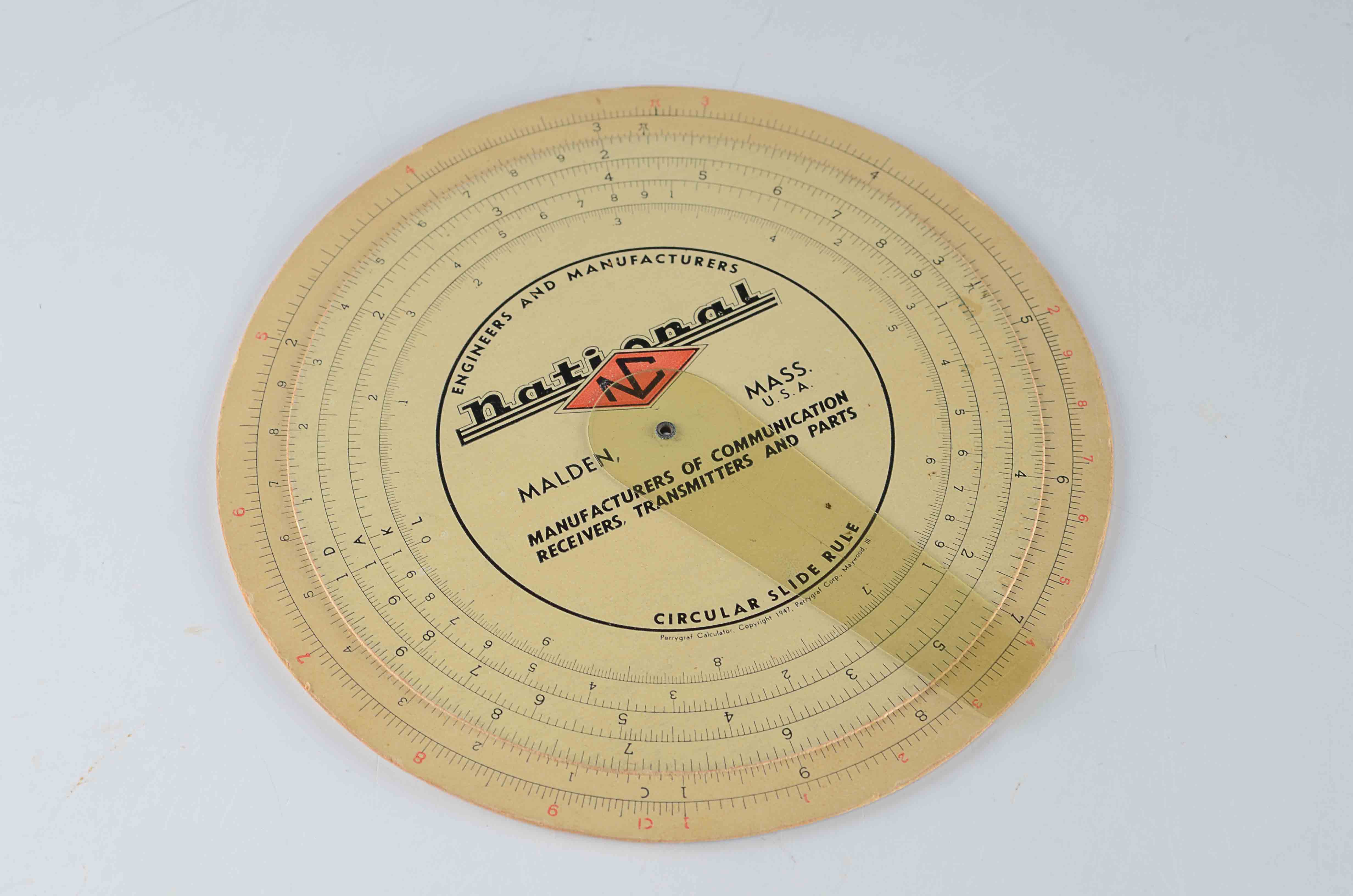 Vintage Circular Slide Rule and RME DX Computer