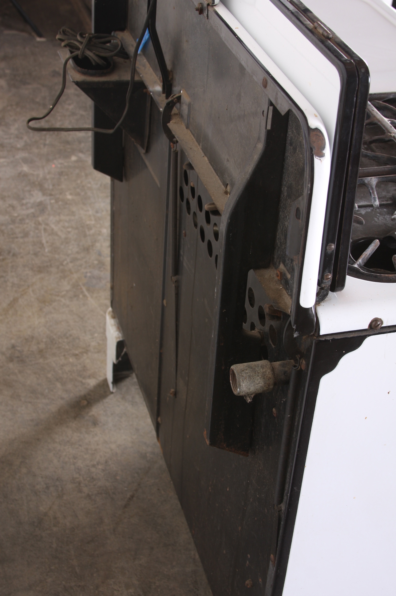 1940's Magic Chef gas stove in black and white 