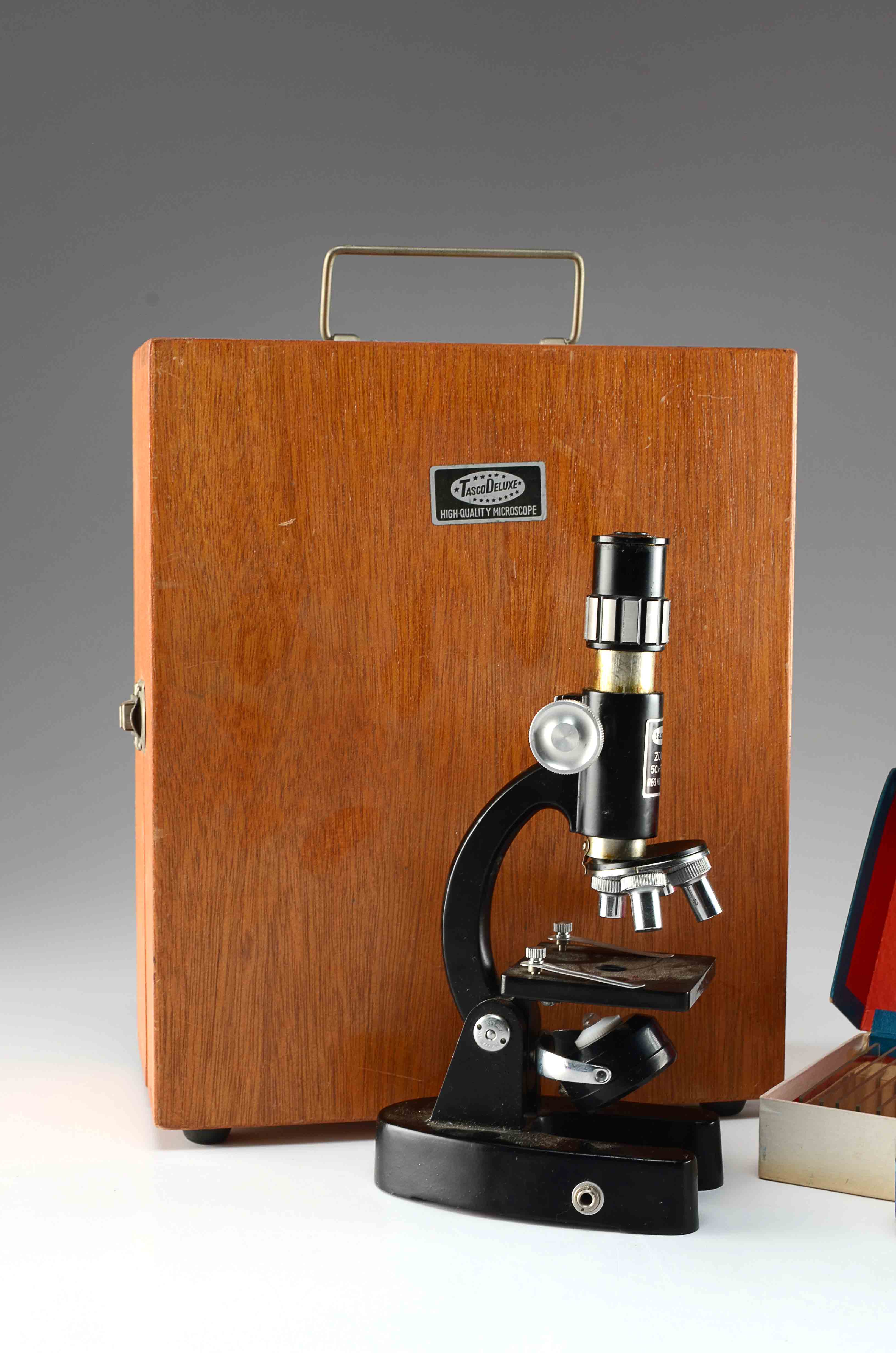 A Vintage Tasco 50x-750x Zoom Microscope 