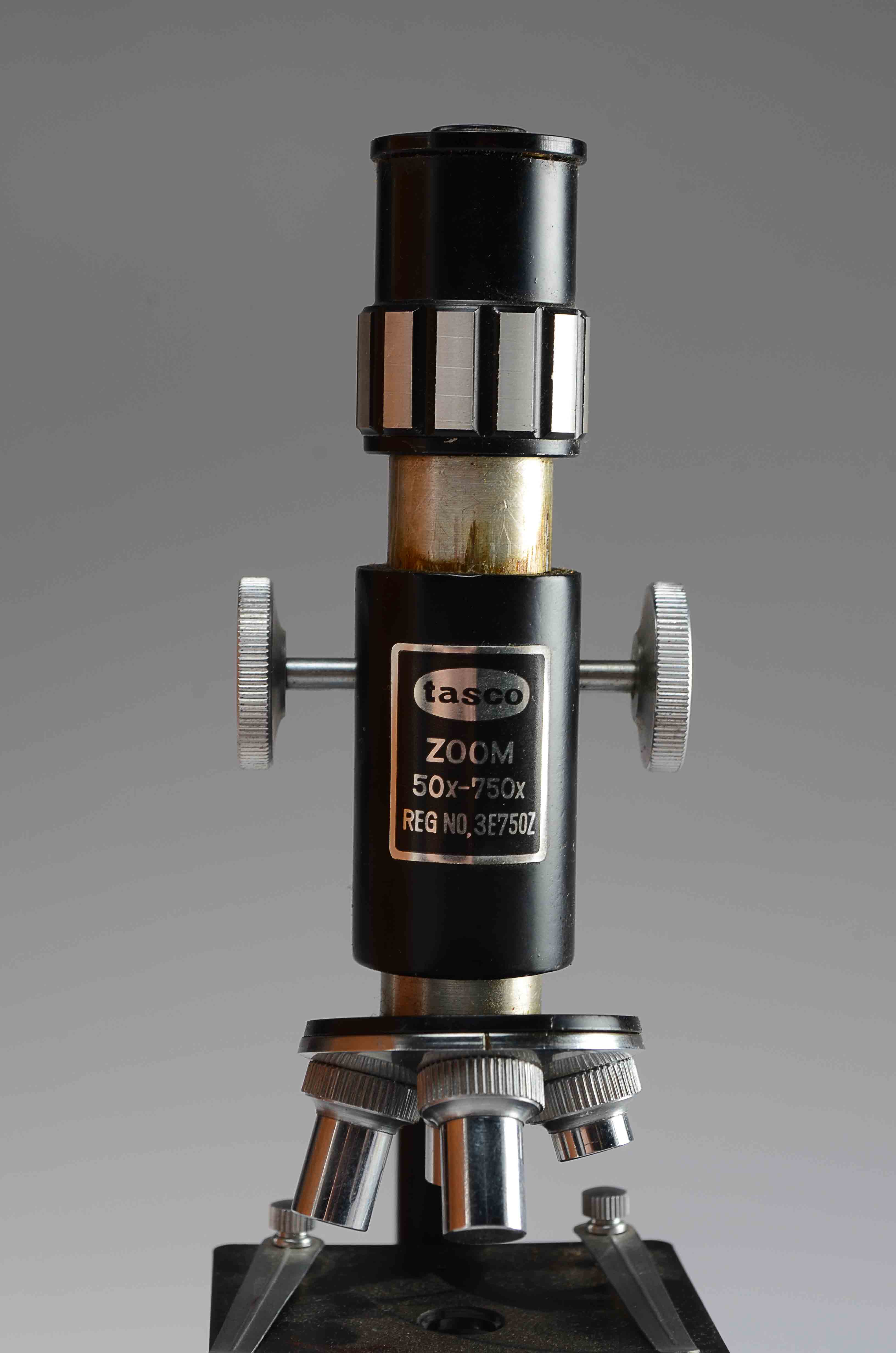 A Vintage Tasco 50x-750x Zoom Microscope 