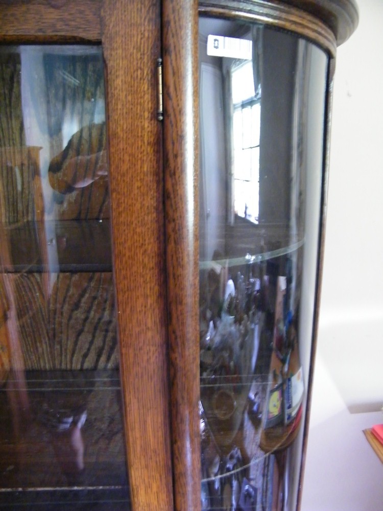 Golden Oak Curved Glass China Cabinet