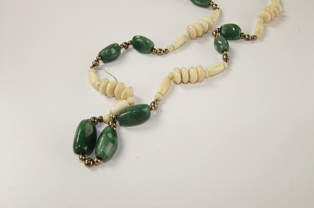 Vintage 34" polished natural stone necklace with various hued stones 