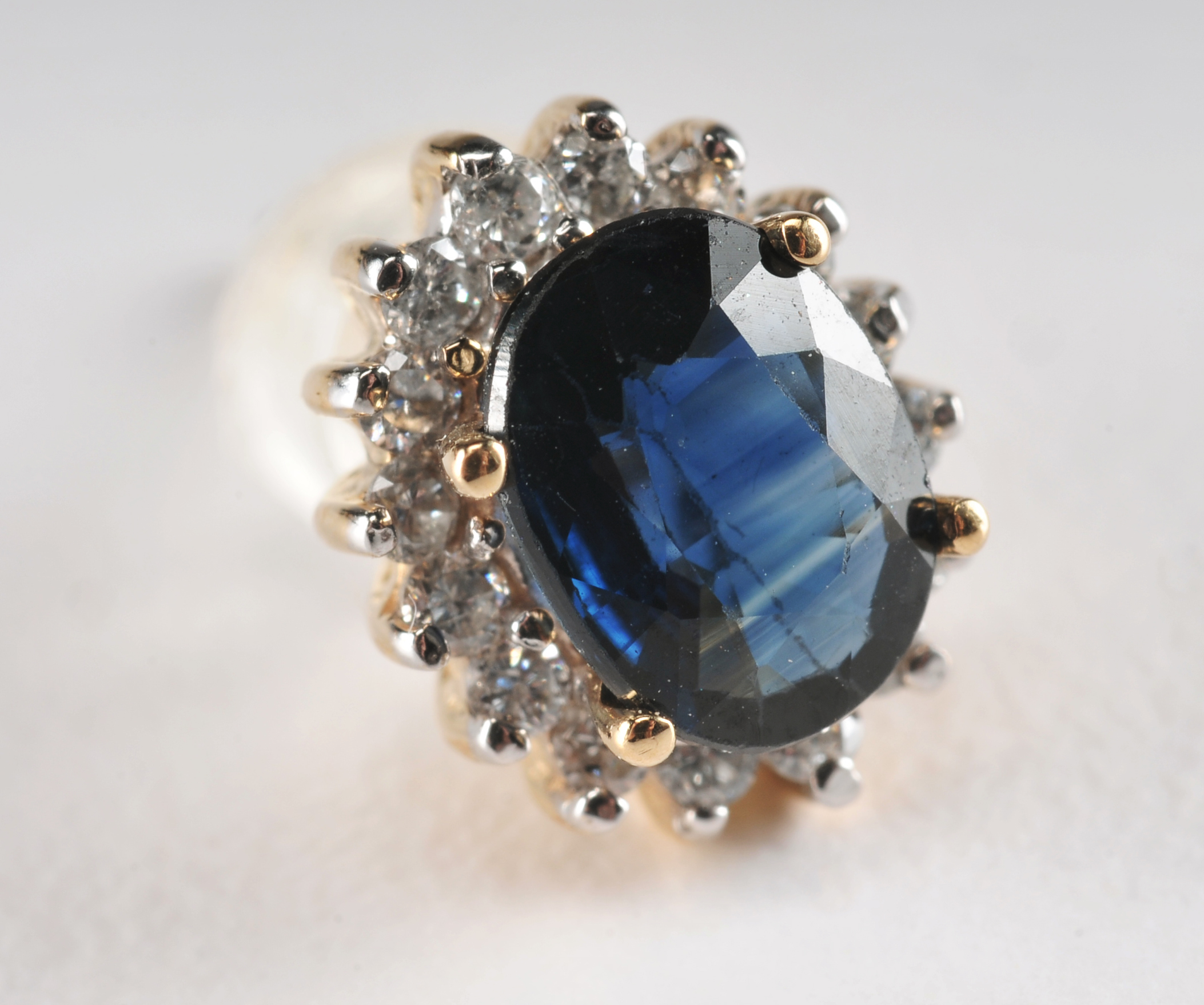 Ladies 14 K Sapphire and diamond two tone ring with matching earrings