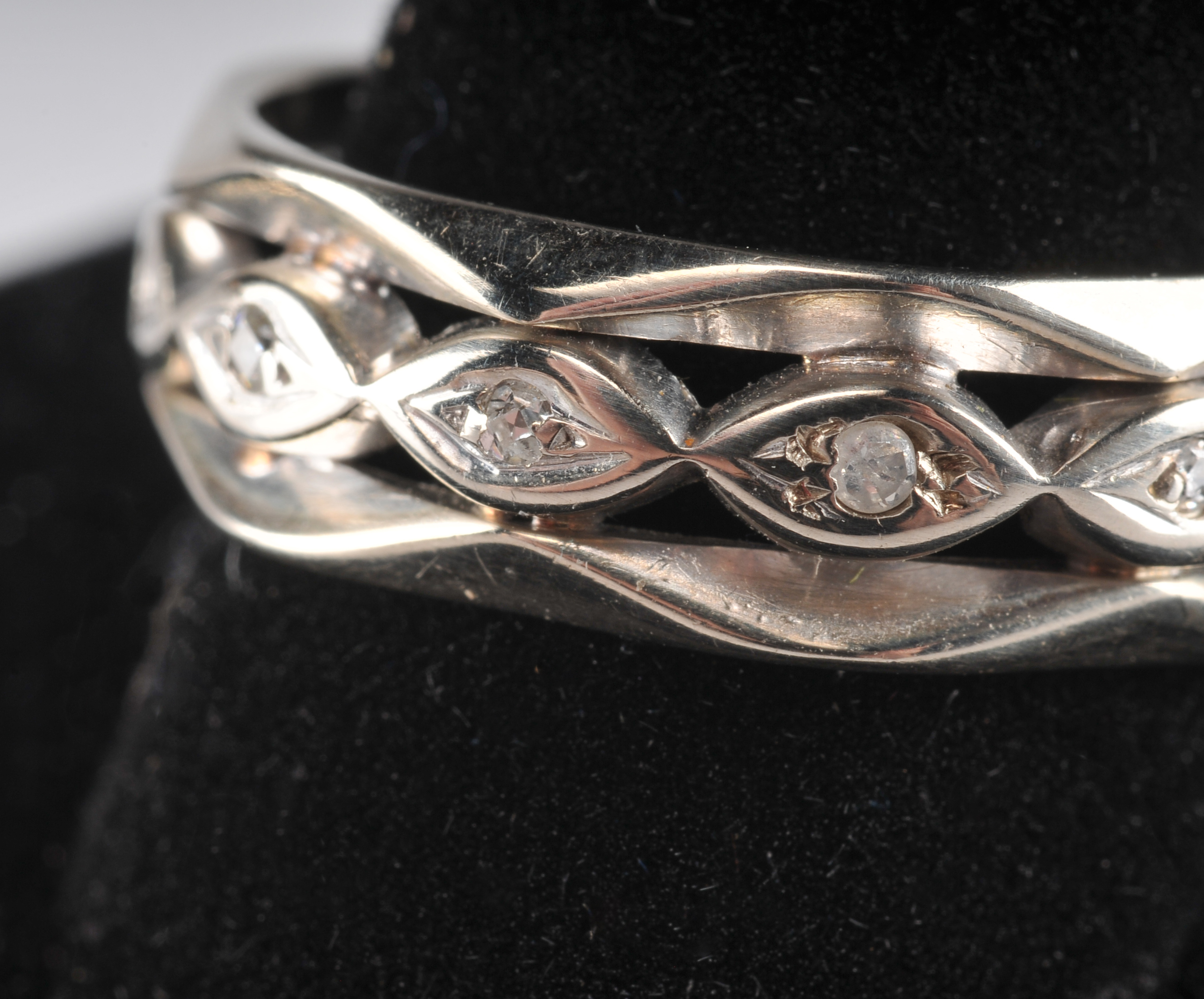 Unique 14 K white gold and diamond band 