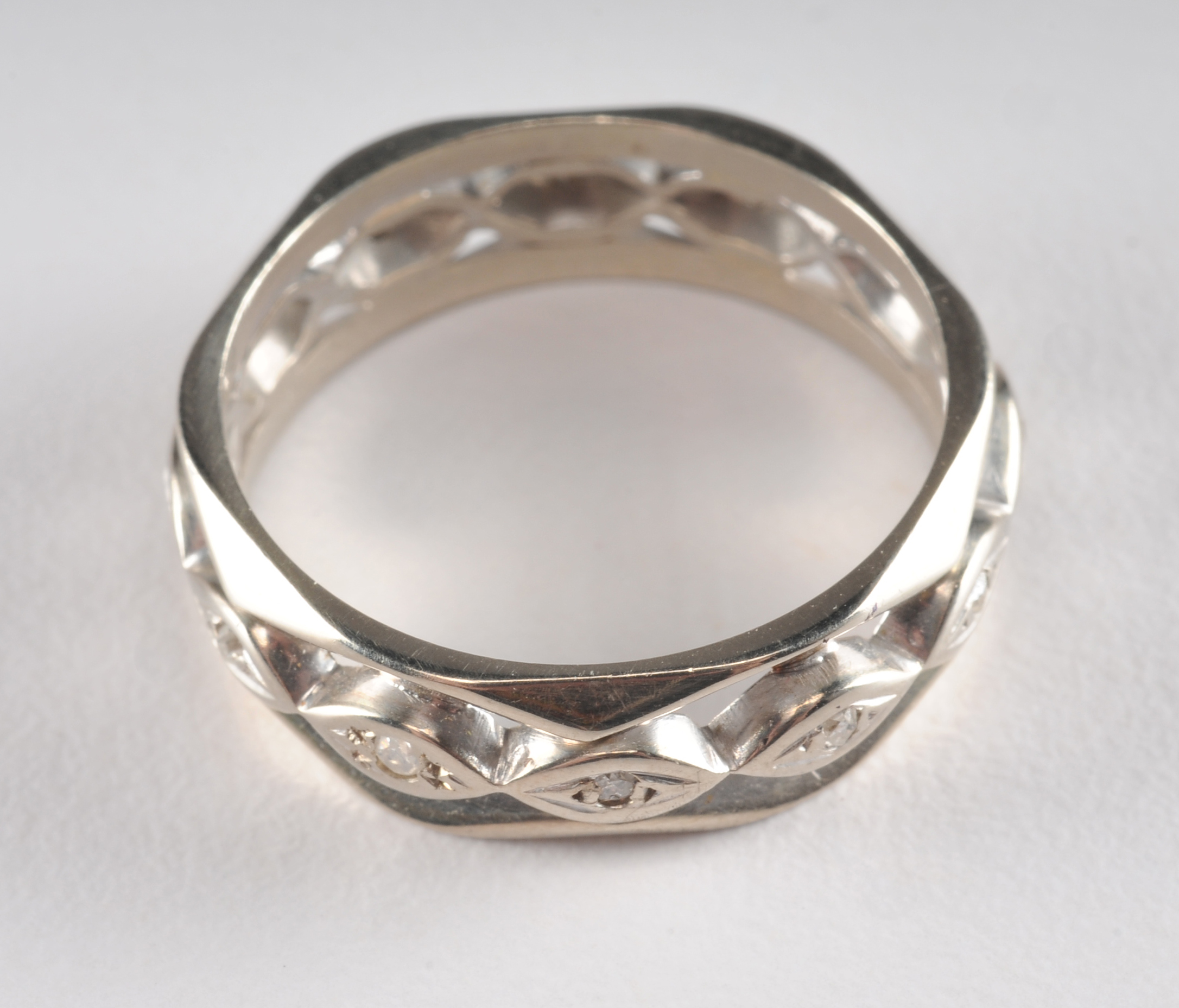 Unique 14 K white gold and diamond band 