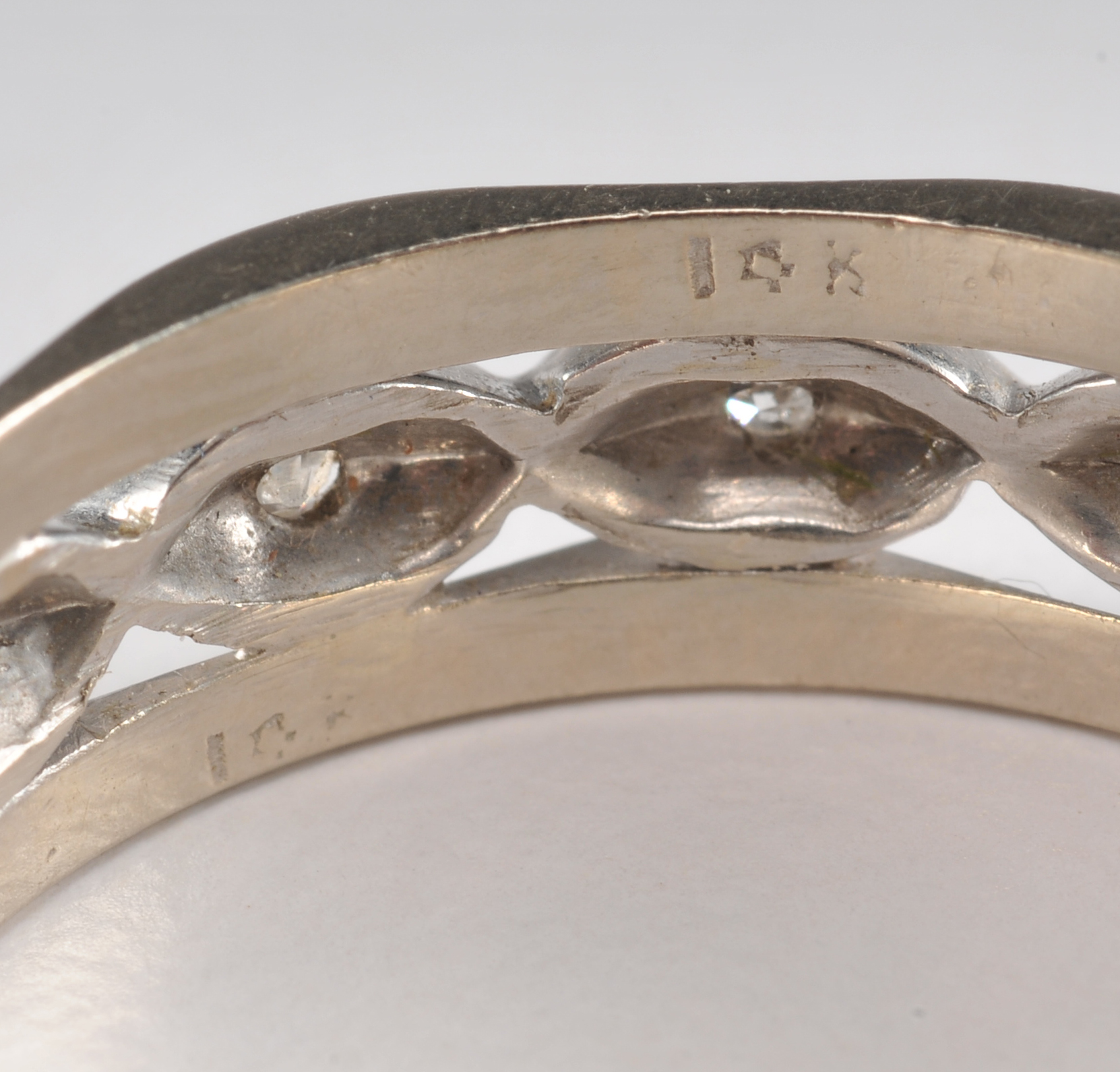 Unique 14 K white gold and diamond band 