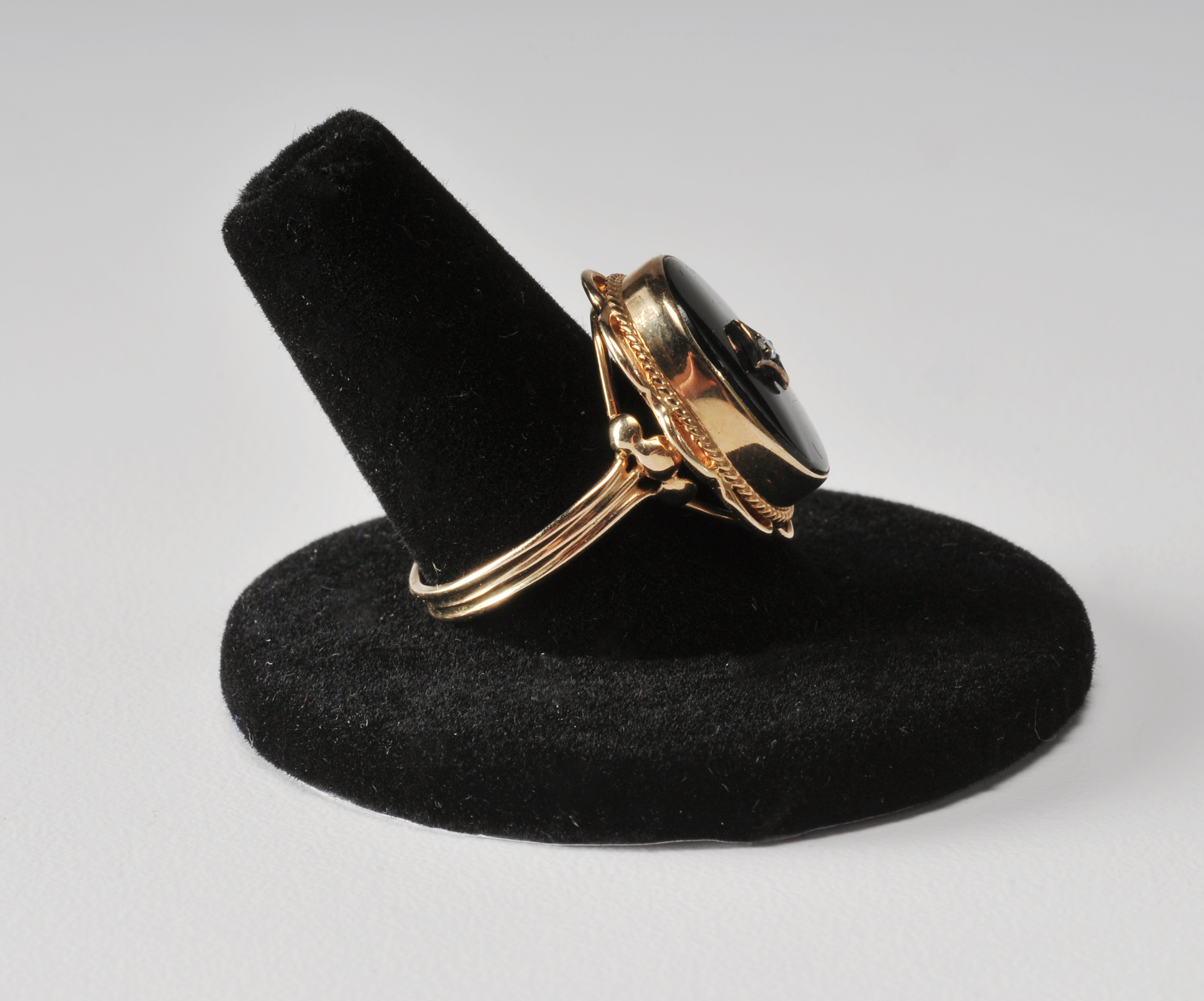 Ladies 14 K yellow gold black onyx and diamond ring