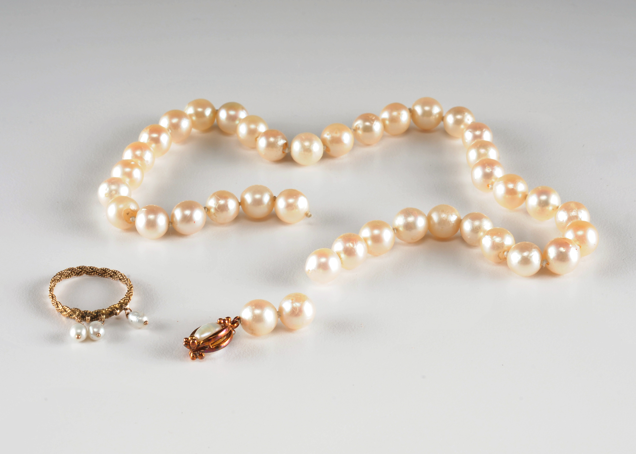 Strand of (39) genuine double knotted pearls and freshwater pearl ring