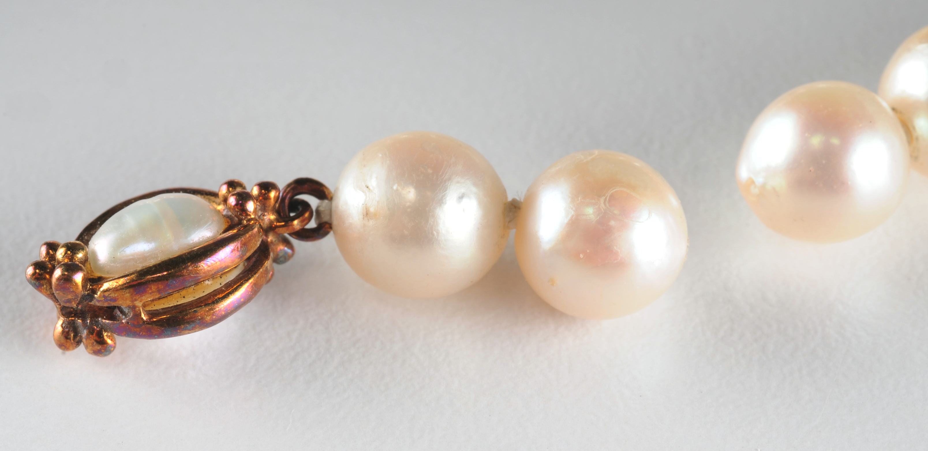 Strand of (39) genuine double knotted pearls and freshwater pearl ring
