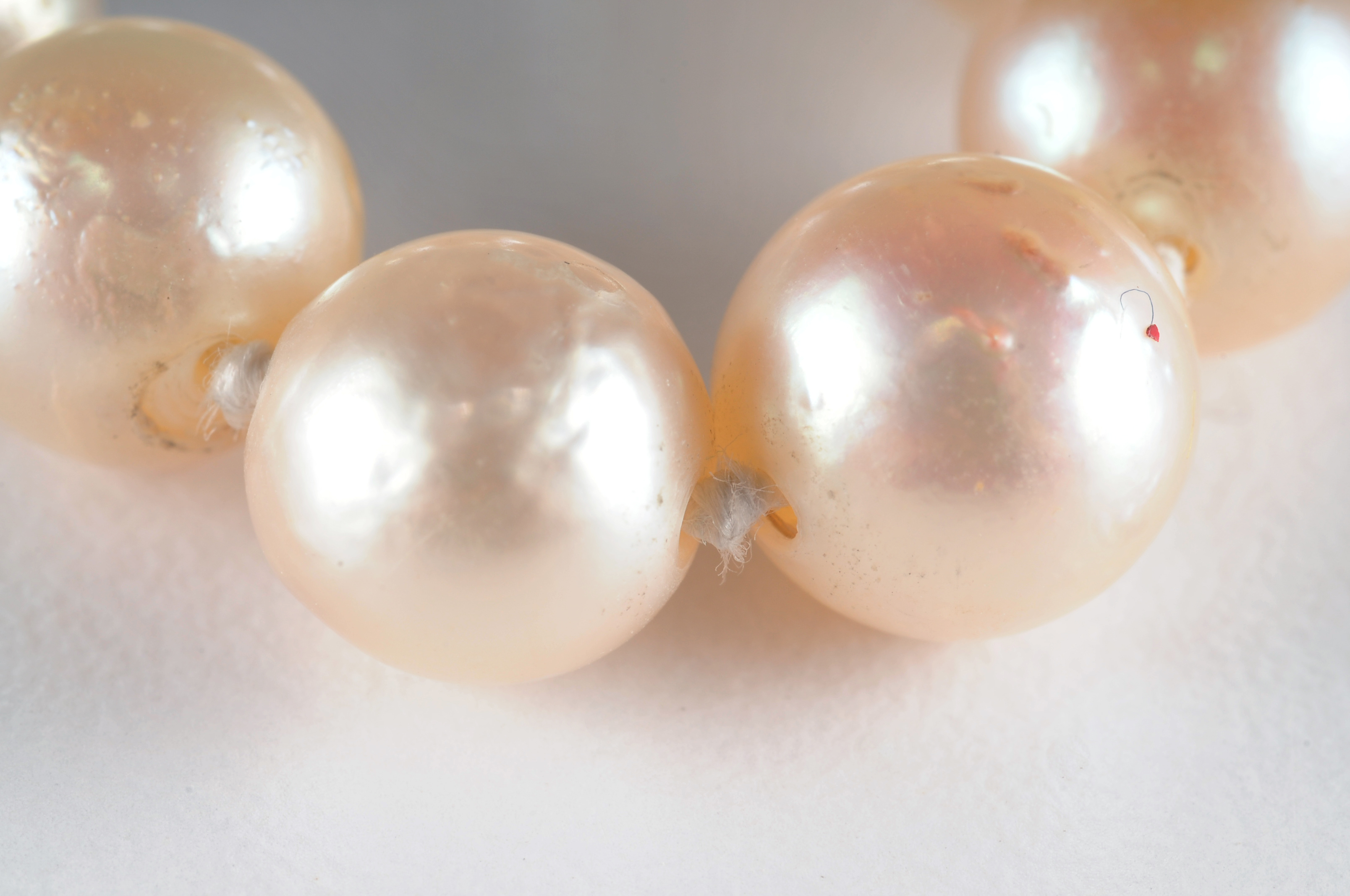 Strand of (39) genuine double knotted pearls and freshwater pearl ring