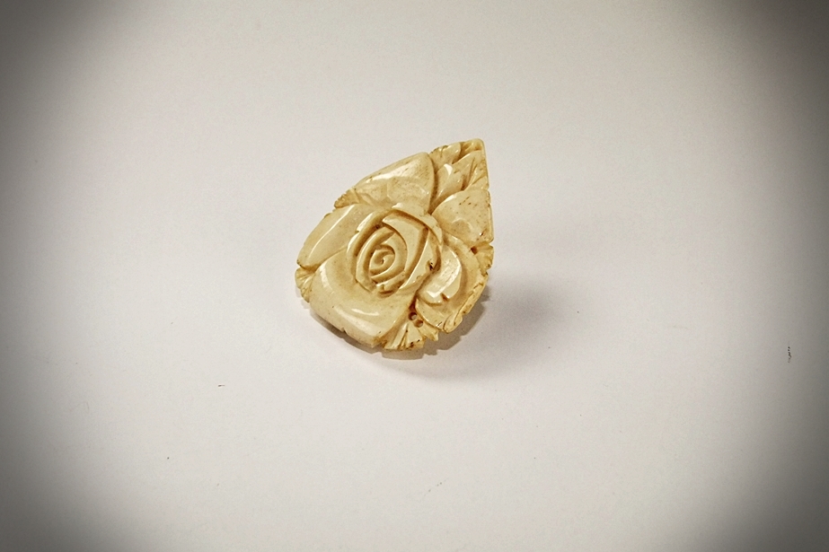 Early 20th Century hand carved ivory fur clip of a Rose