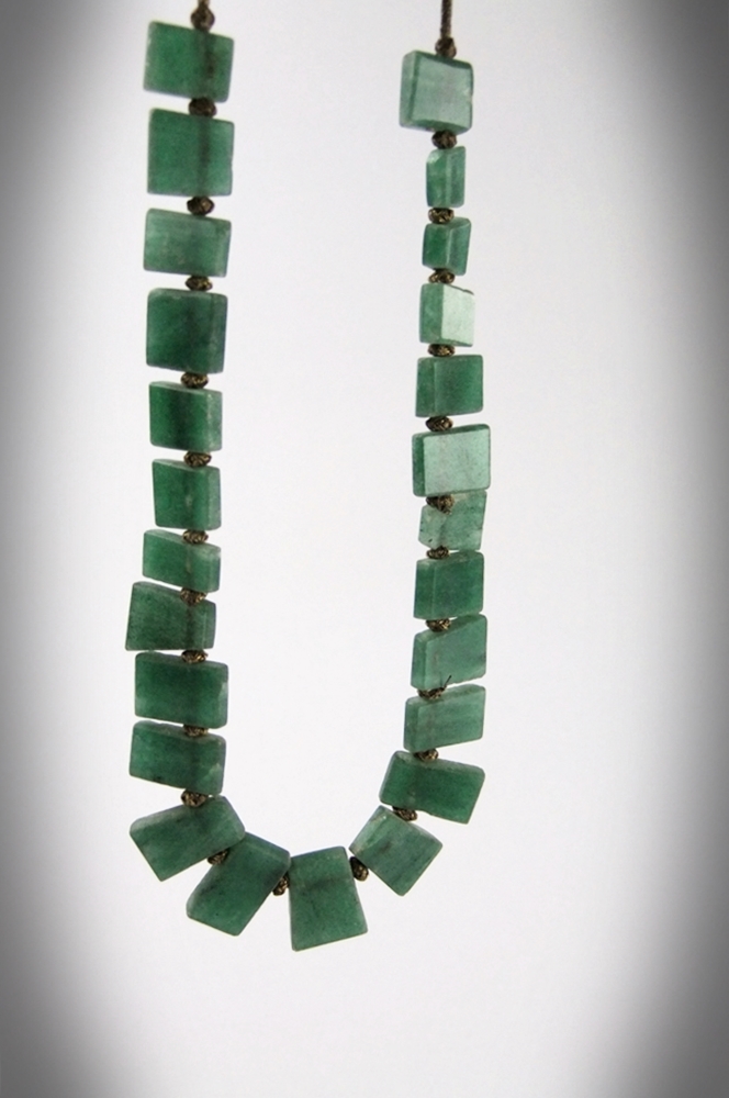 Collection of hand carved natural stone jewelry 