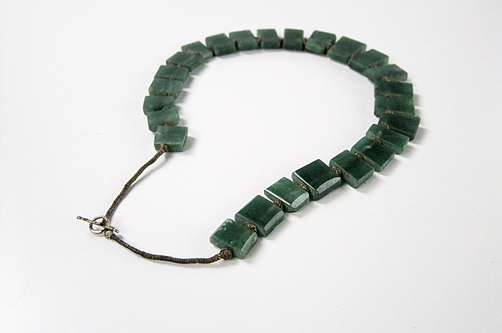 Collection of hand carved natural stone jewelry 