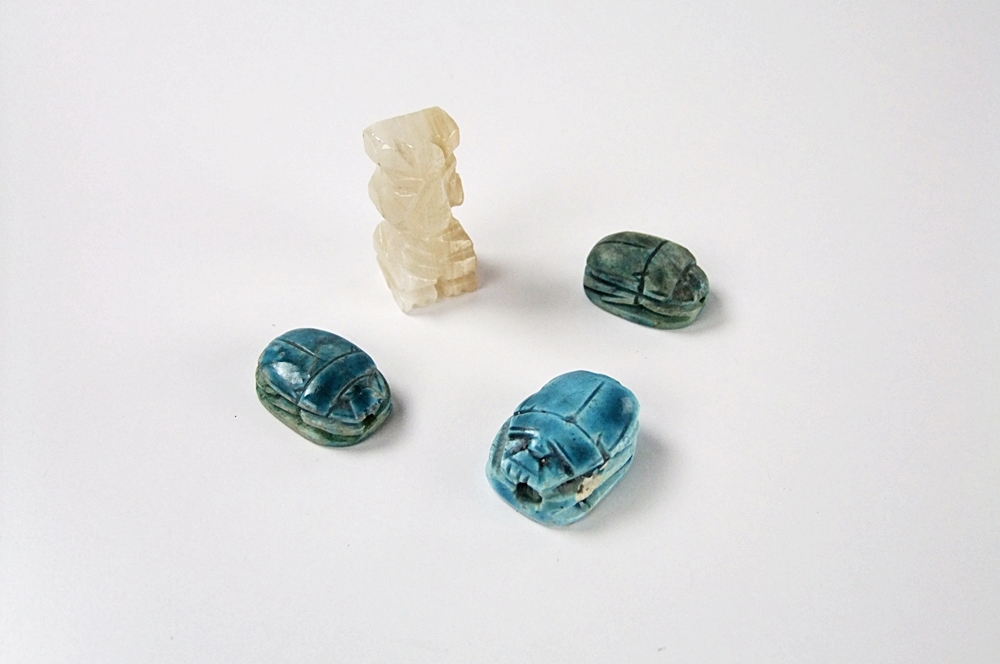 Collection of hand carved natural stone jewelry 