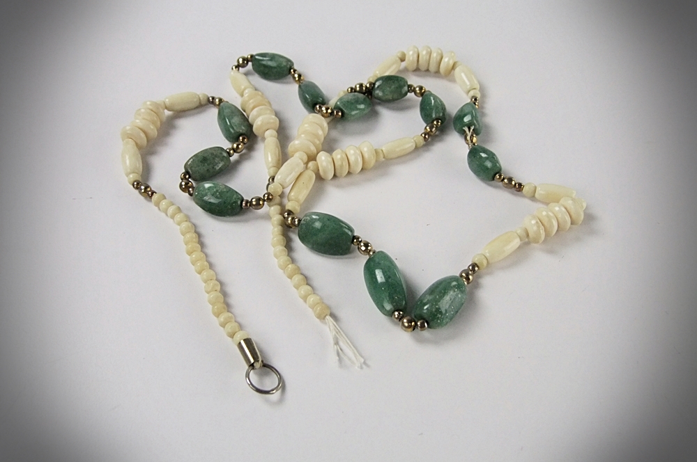 Collection of hand carved natural stone jewelry 