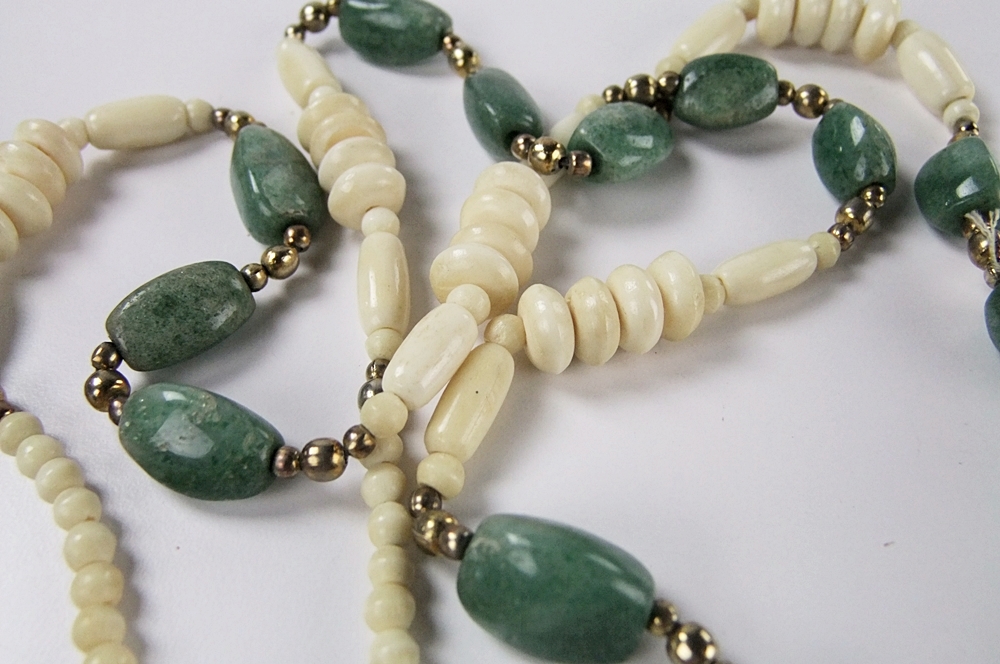 Collection of hand carved natural stone jewelry 