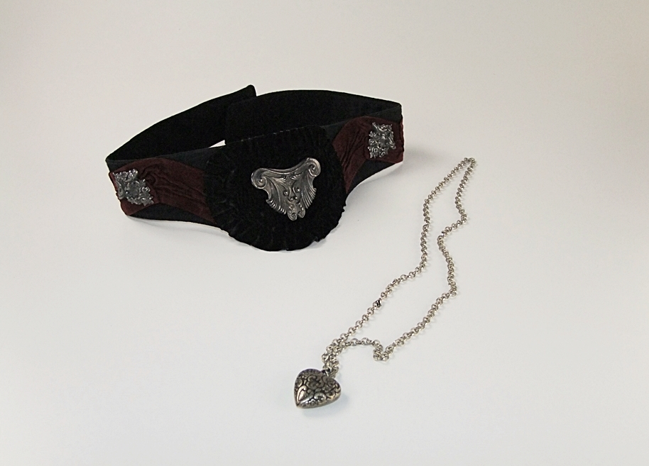 Black cotton belt with black and burgundy suede and applied silvertone Victorian style emblems and necklace