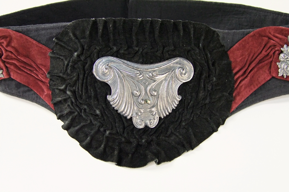 Black cotton belt with black and burgundy suede and applied silvertone Victorian style emblems and necklace