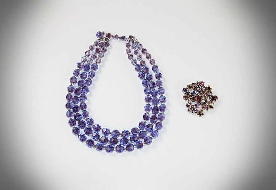 Marvella multi strand faceted cut glass necklace and a multi hued crystal rhinestone brooch 