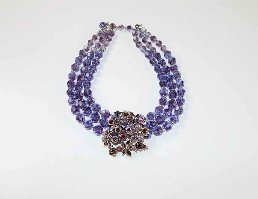 Marvella multi strand faceted cut glass necklace and a multi hued crystal rhinestone brooch 