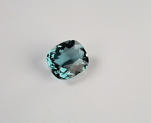Loose cushion cushion cut teal green hued quartz gemstone
