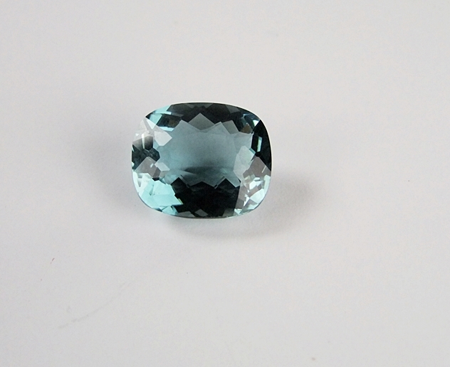 Loose cushion cushion cut teal green hued quartz gemstone