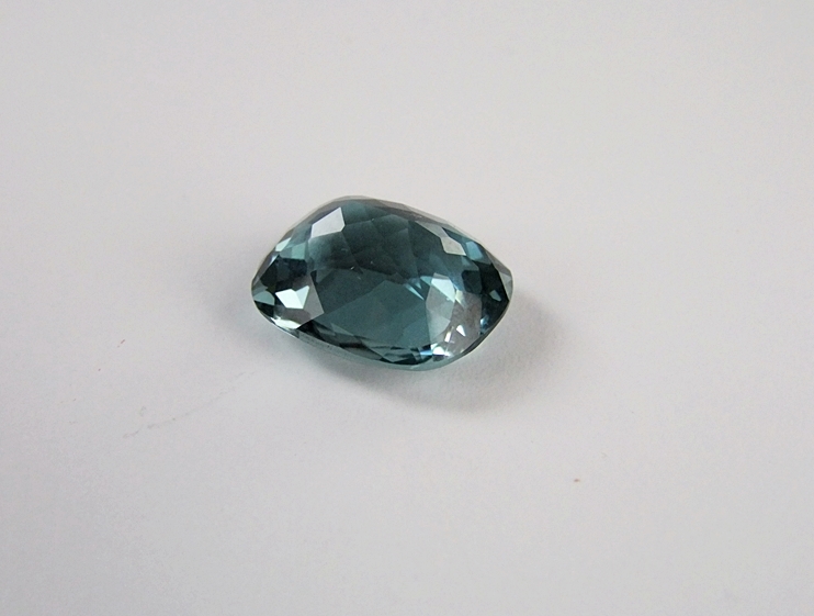 Loose cushion cushion cut teal green hued quartz gemstone