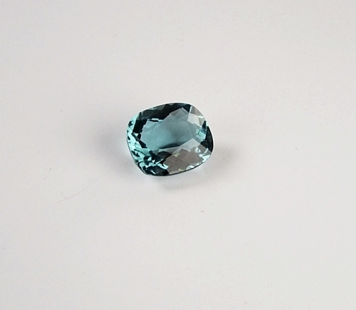 Loose cushion cushion cut teal green hued quartz gemstone