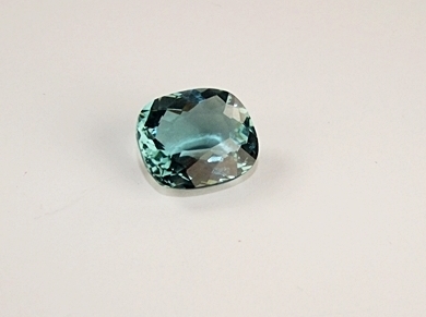 Loose cushion cushion cut teal green hued quartz gemstone