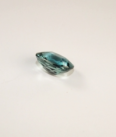 Loose cushion cushion cut teal green hued quartz gemstone