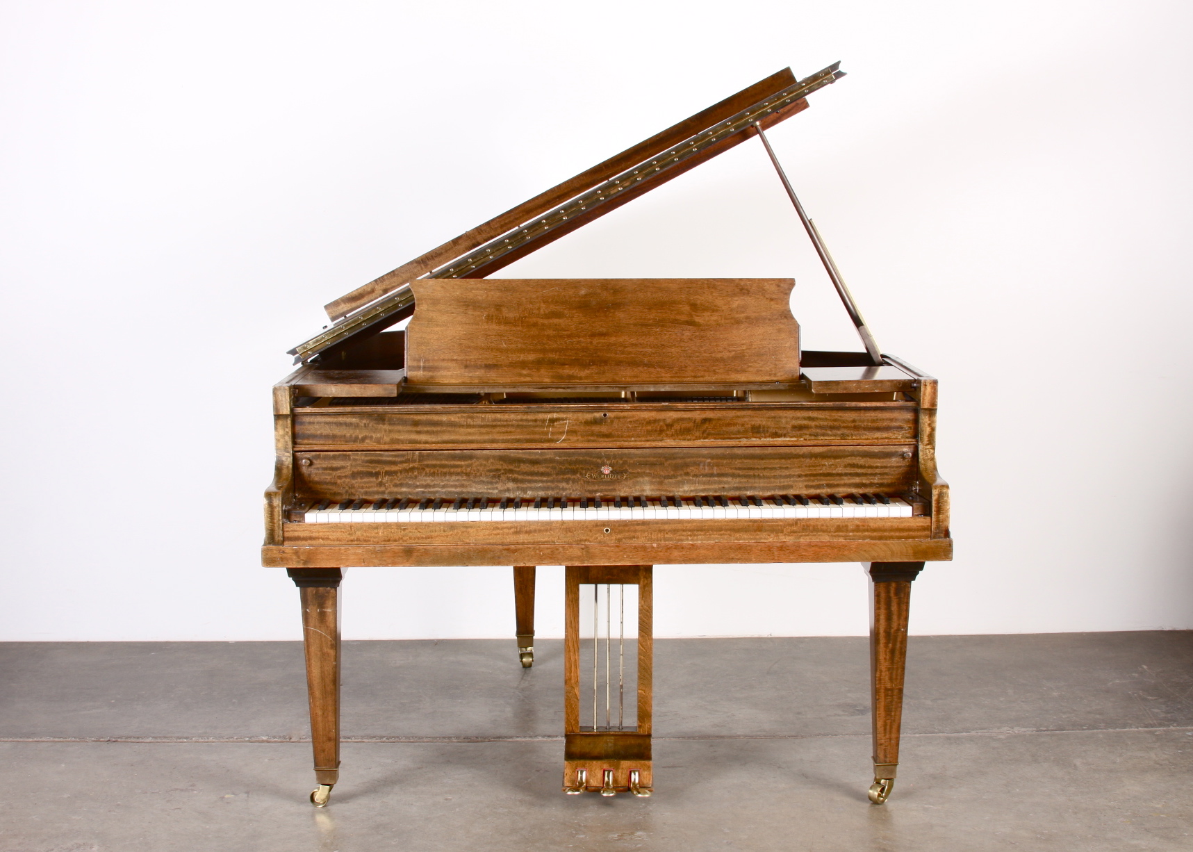 Antique Wurlitzer Baby Grand Piano