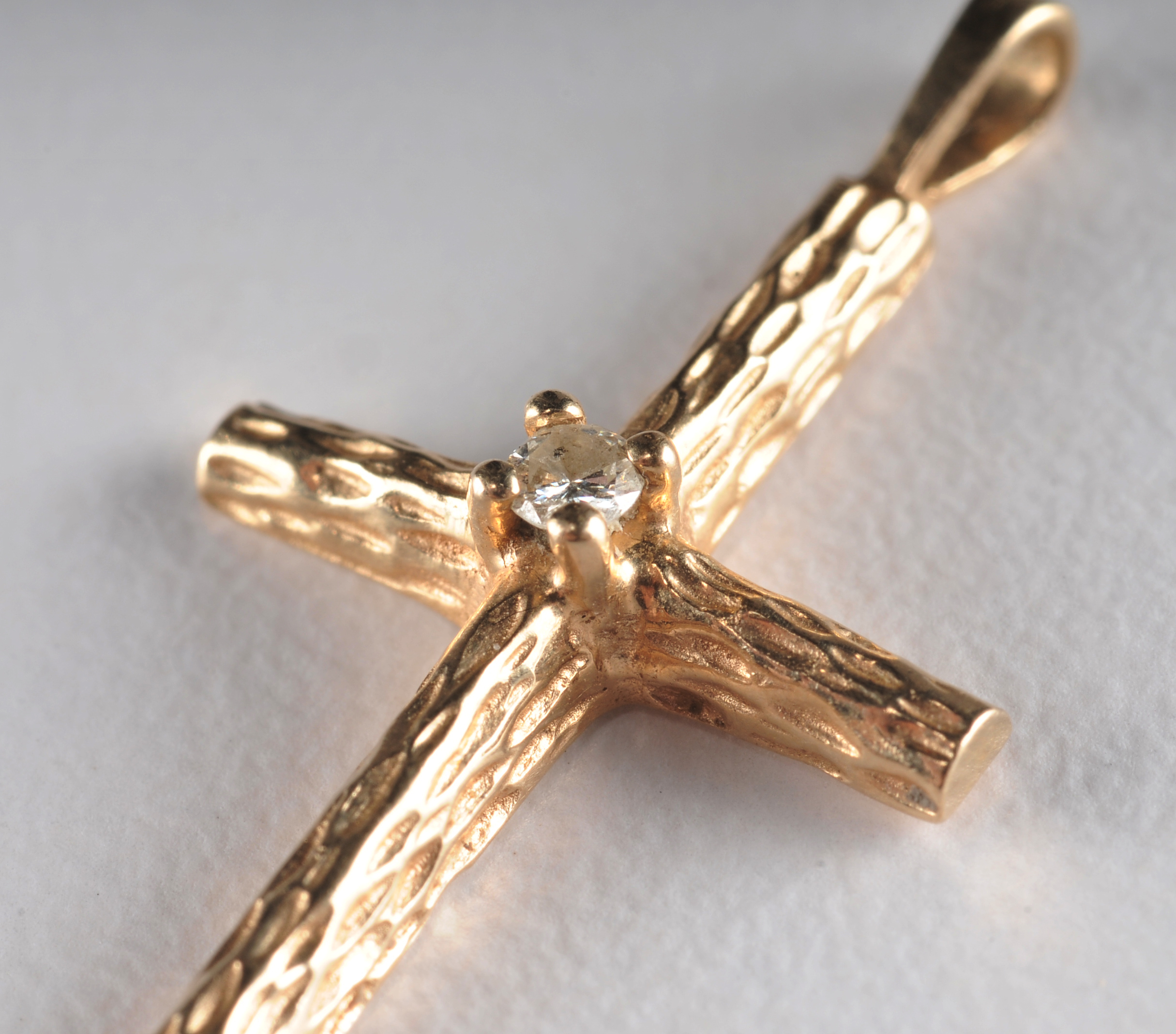  10 K yellow gold necklace and pendant and a 14 K yellow gold cross and diamond pendant 