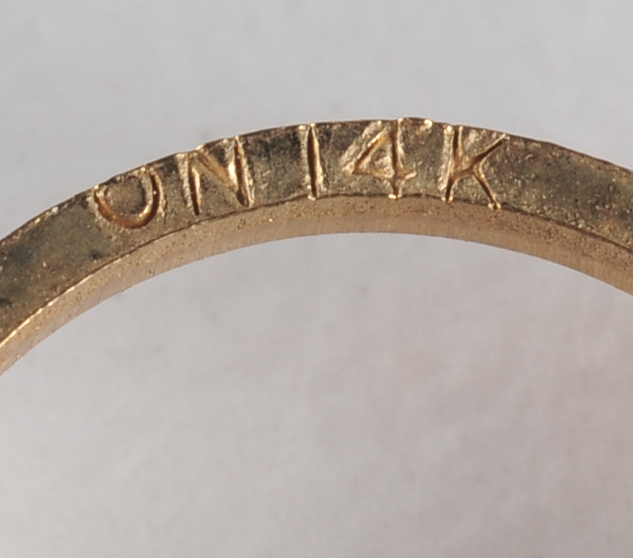 14 K yellow gold loop earrings with Rams head 