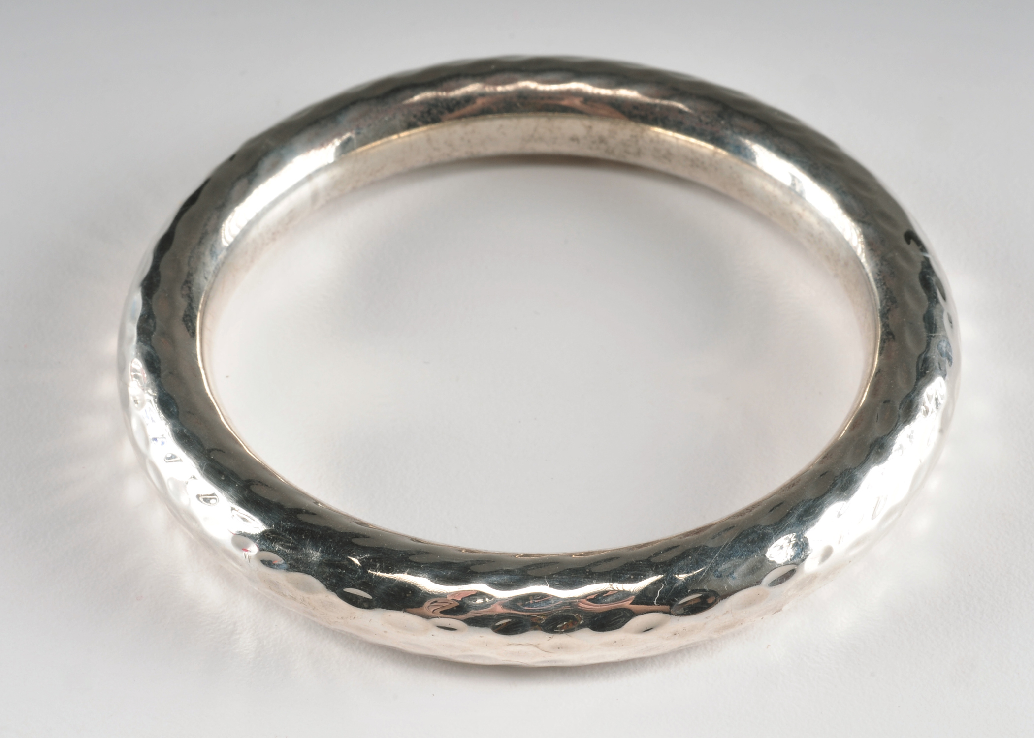 Silpada hollowed sterling silver bangle with hammered design