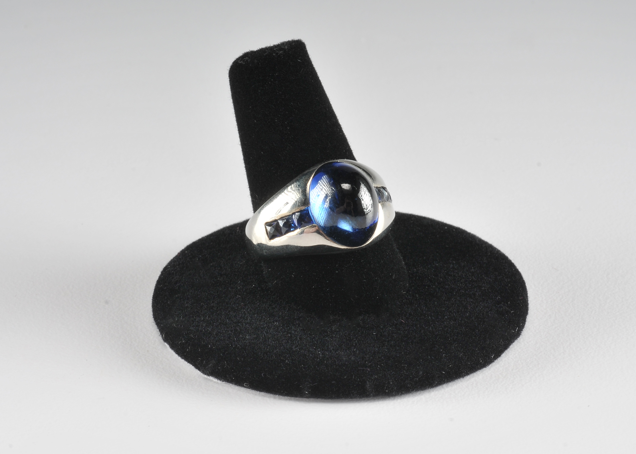 Ladies unique 18 K white gold ring with synthetic sapphires