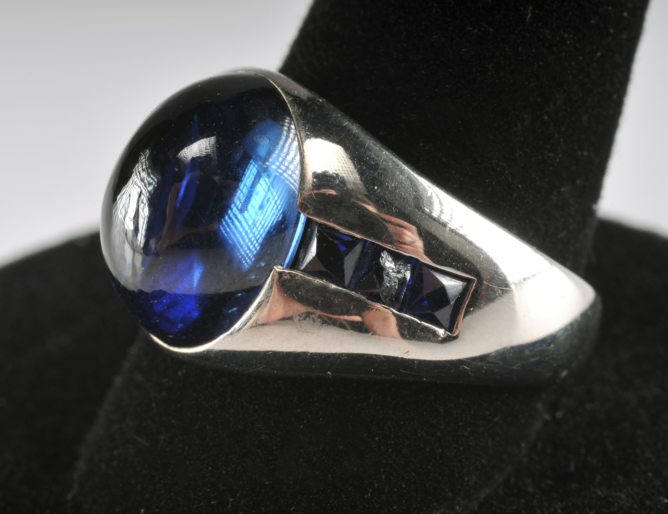 Ladies unique 18 K white gold ring with synthetic sapphires