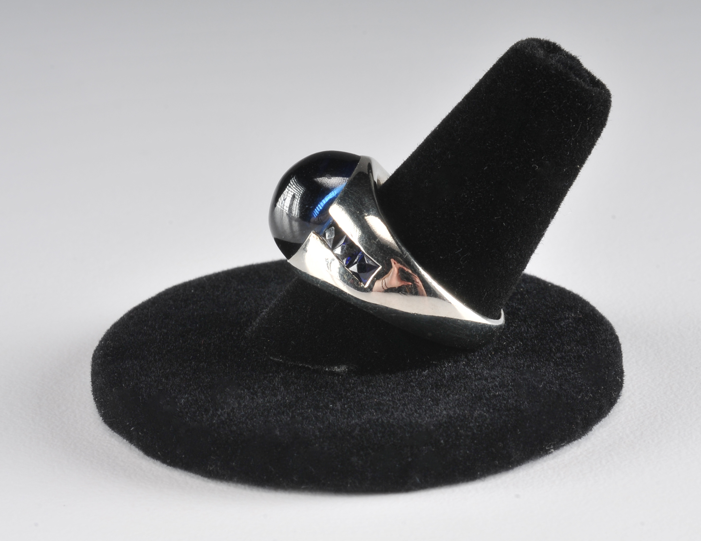 Ladies unique 18 K white gold ring with synthetic sapphires