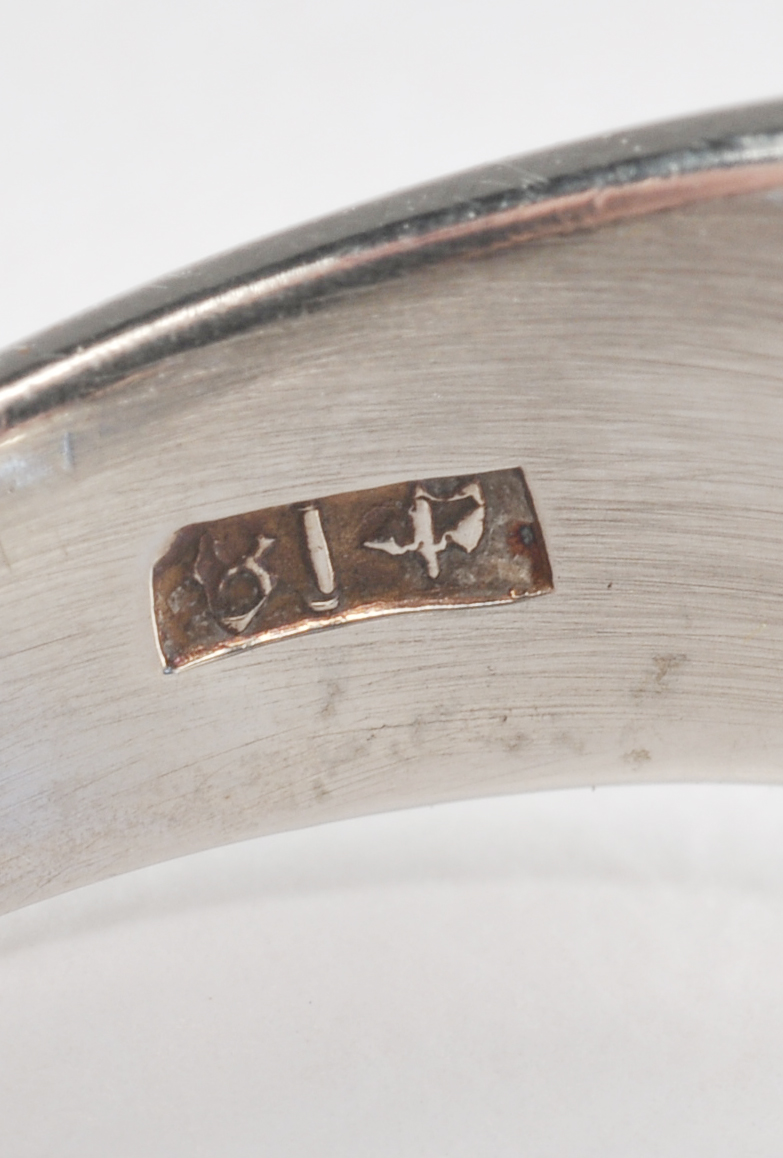 Ladies unique 18 K white gold ring with synthetic sapphires