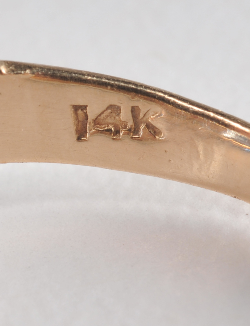 14 K yellow gold ladies cocktail ring with synthetic spinel and two  synthetic ruby red stones