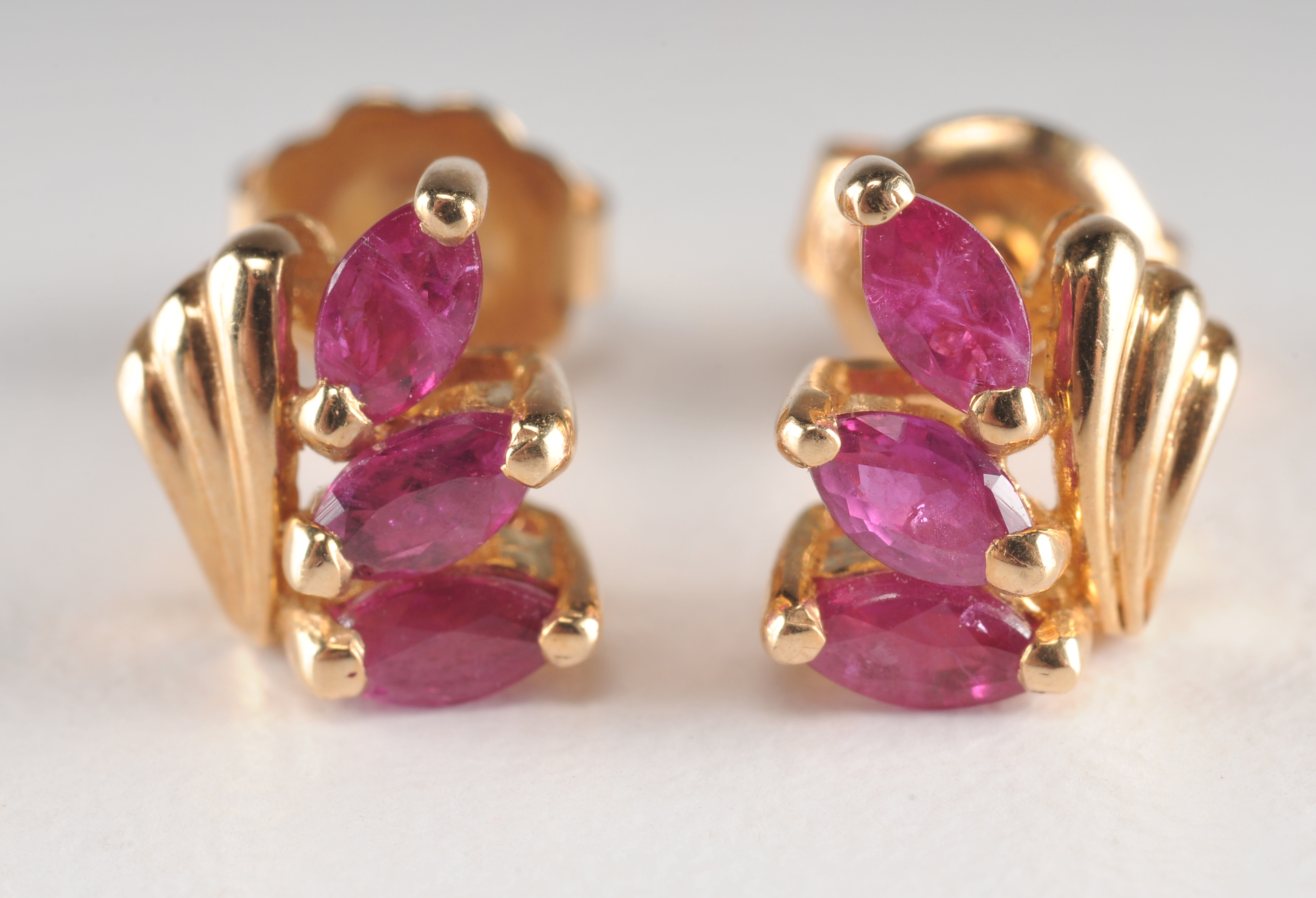Pair of 14 K yellow gold and ruby earrings