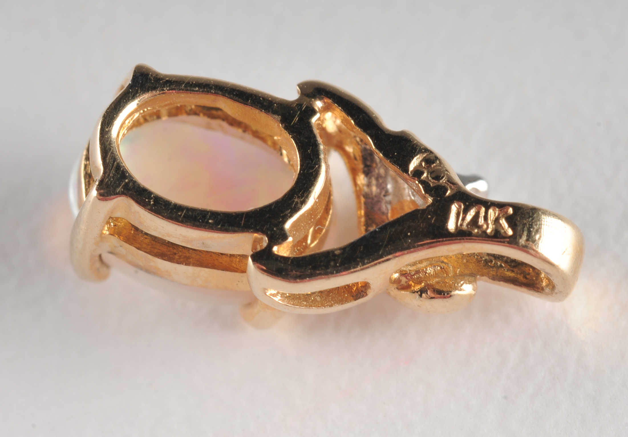 14 K yellow gold opal and diamond pendant