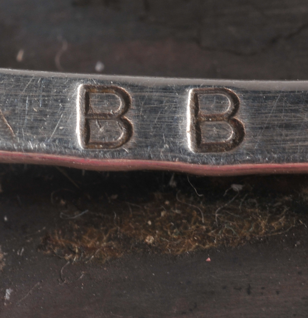 Native American Navajo silver cuff bracelet with inlaid Mother of Pearl