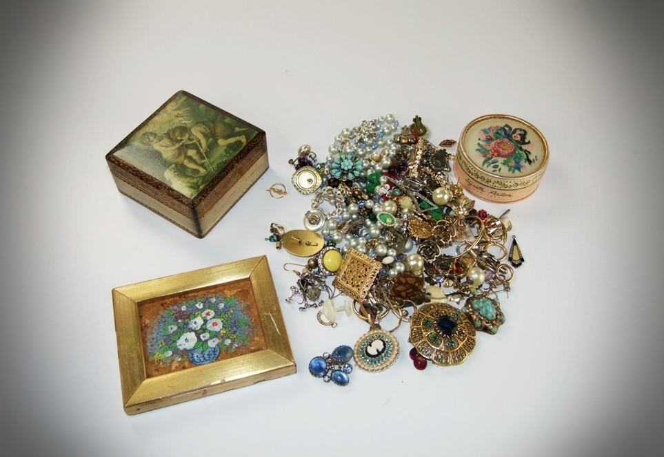 Collection of vintage jewelry and decorative items