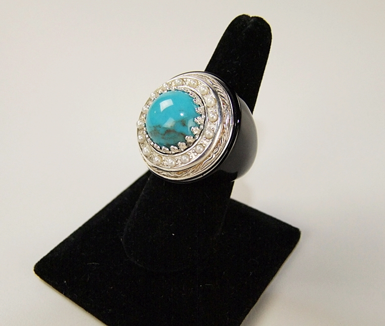 Unique Ladies ring with sterling silver and turquoise stone 