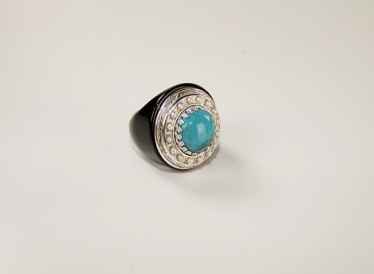 Unique Ladies ring with sterling silver and turquoise stone 