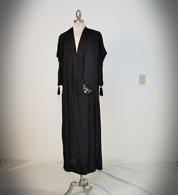 Early 20th Century black cocktail dress with hand stitched applique 