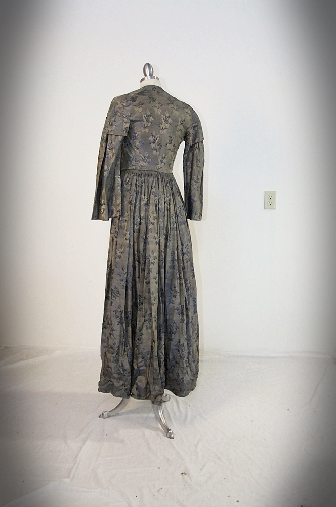 19th Century silk brocade gown in a slate blue gray with royal blue and cream floral sprays 
